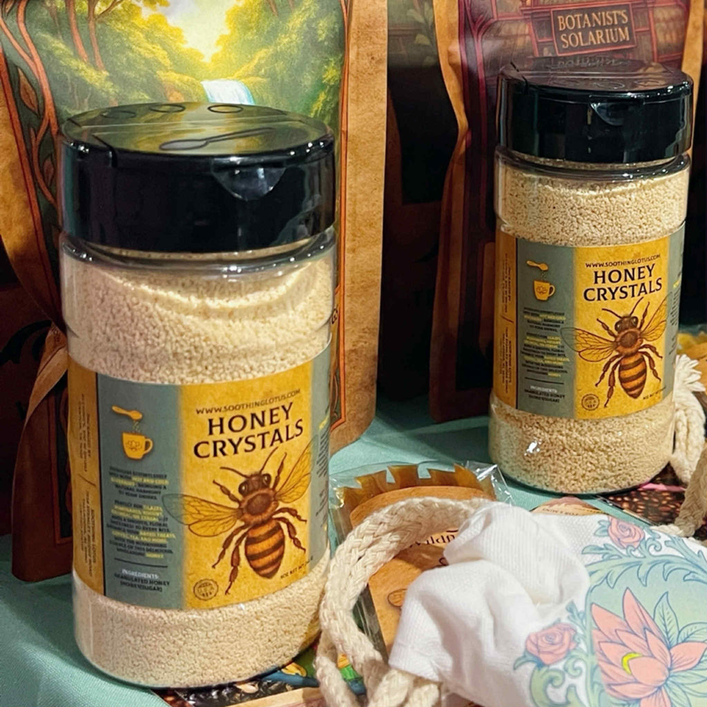 Two bottles of Honey Crystals with a bee label on a colorful background